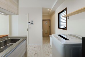 Basic Apartment | Private kitchen | Full-size fridge, microwave, stovetop, coffee/tea maker