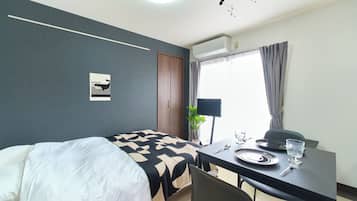Appartamento, 1 letto matrimoniale, non fumatori | 2 camere, una scrivania, ferro/asse da stiro, Wi-Fi gratuito