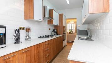 Microwave, stovetop, coffee/tea maker, electric kettle