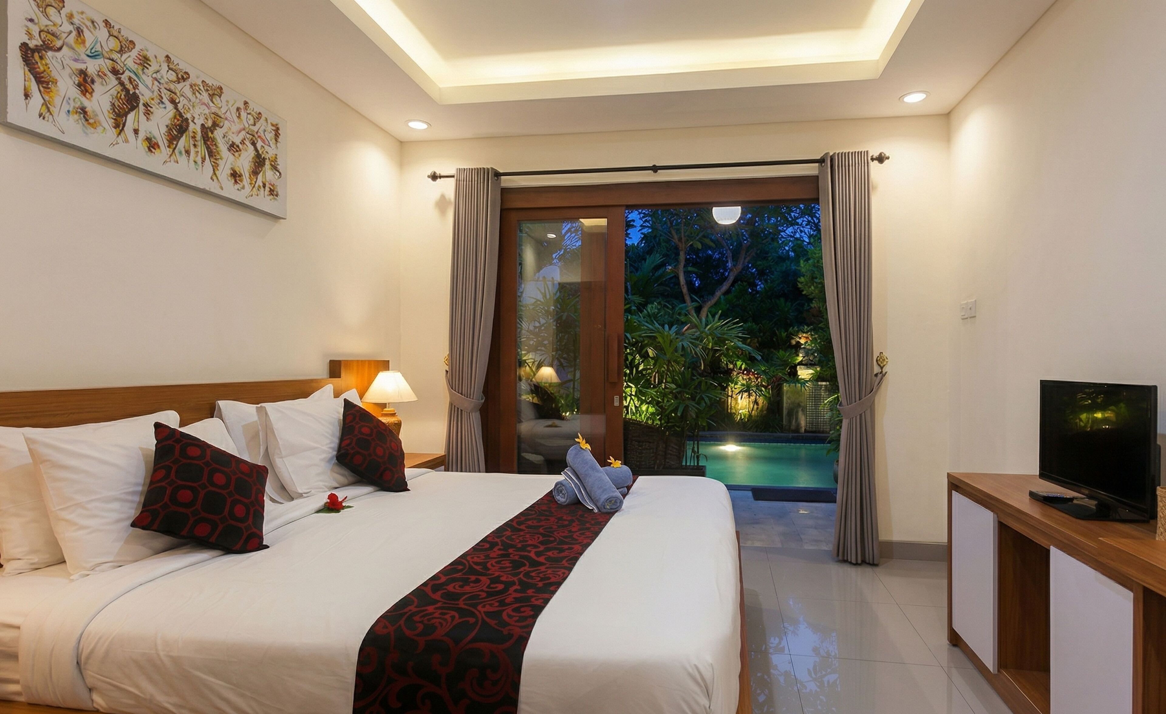 Habitación doble Deluxe, acceso a la alberca | Vista al jardín