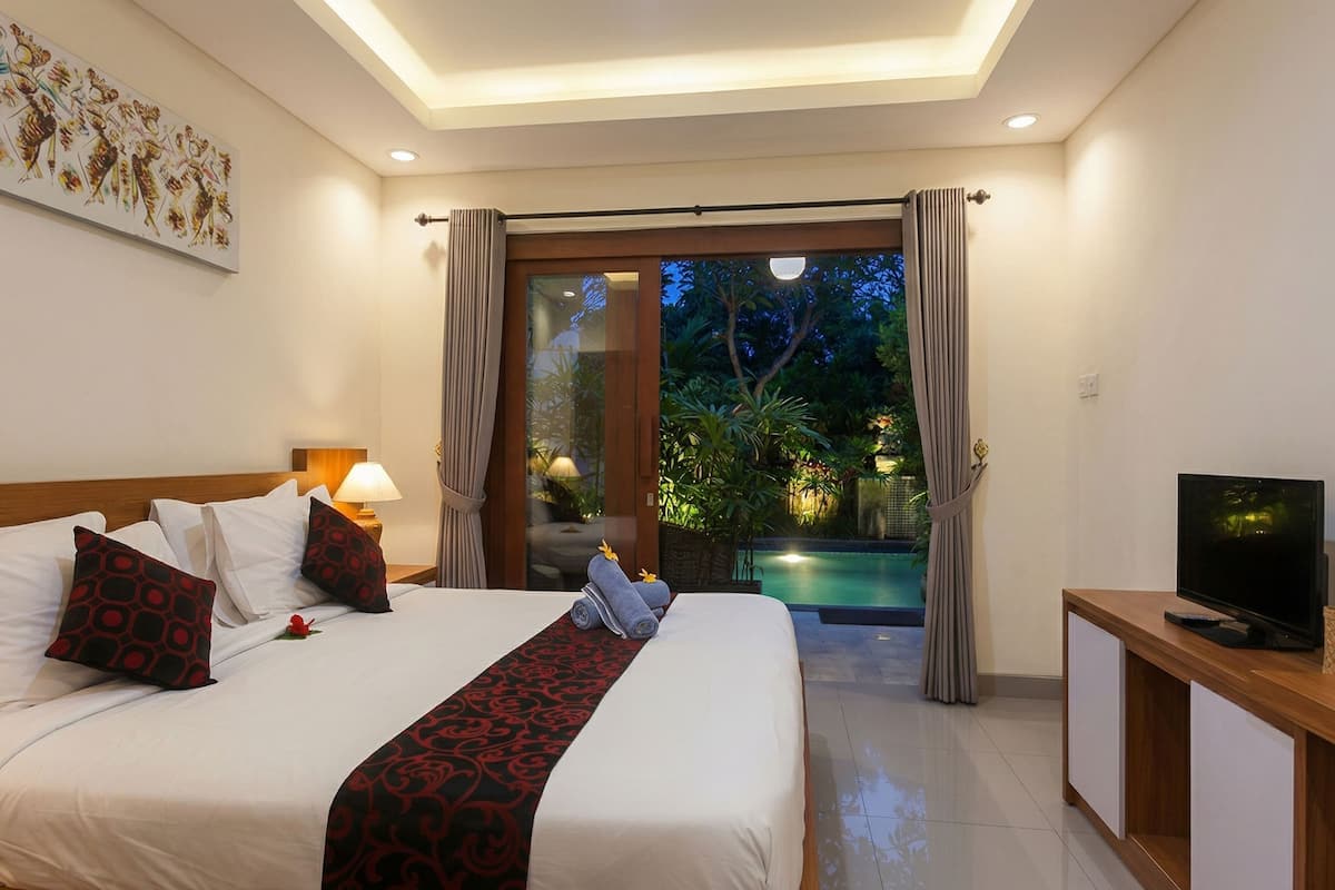 Habitación doble Deluxe, acceso a la alberca | Vista al jardín