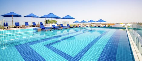 Outdoor pool, pool umbrellas, pool loungers