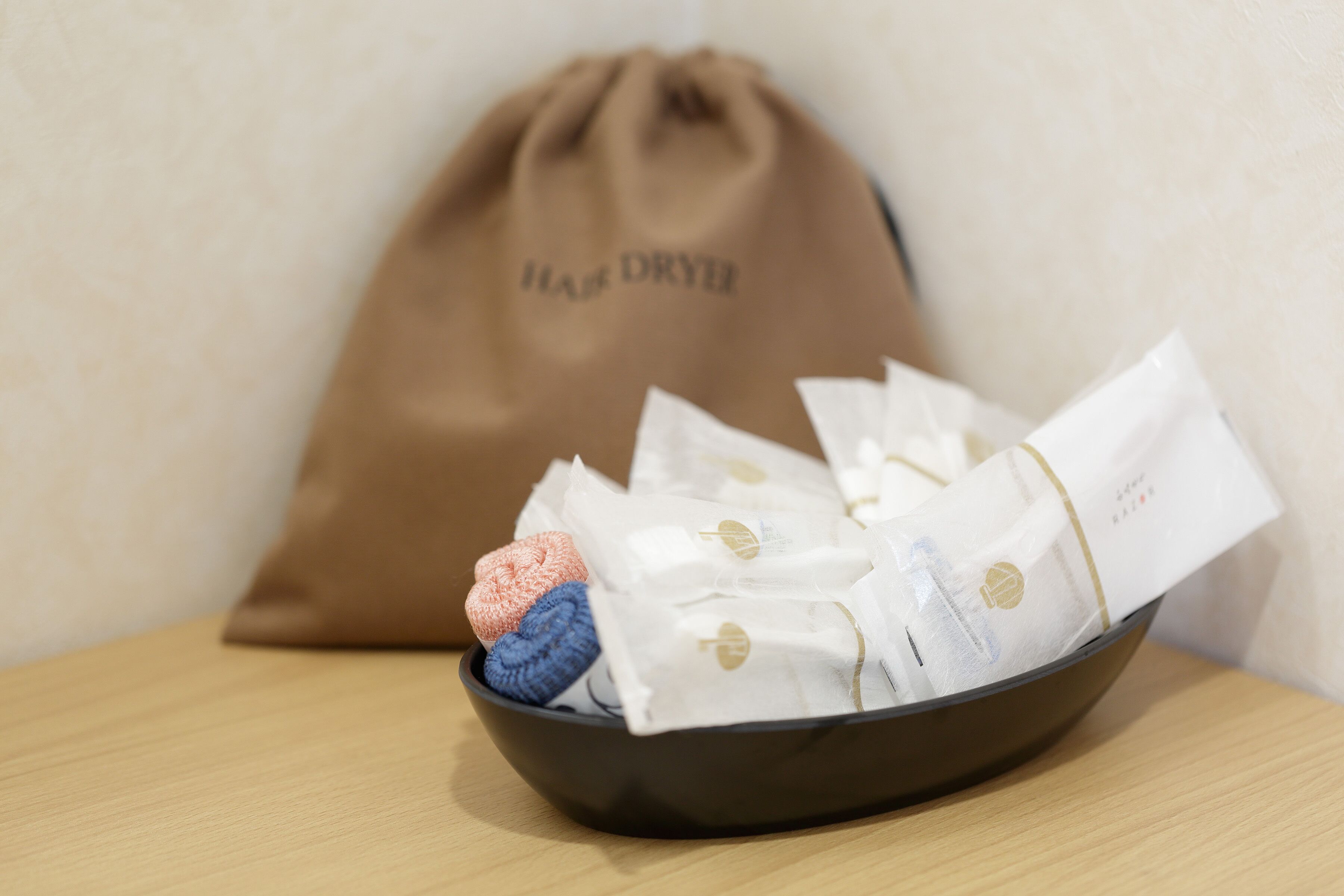 combined shower/bathtub, free toiletries, hair dryer, slippers