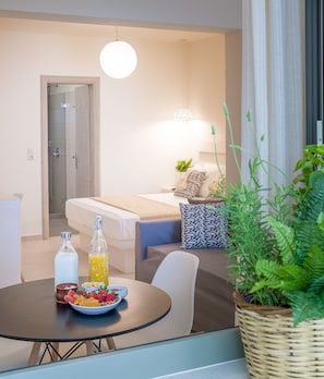 Double or Twin Room | Living area | Flat-screen TV