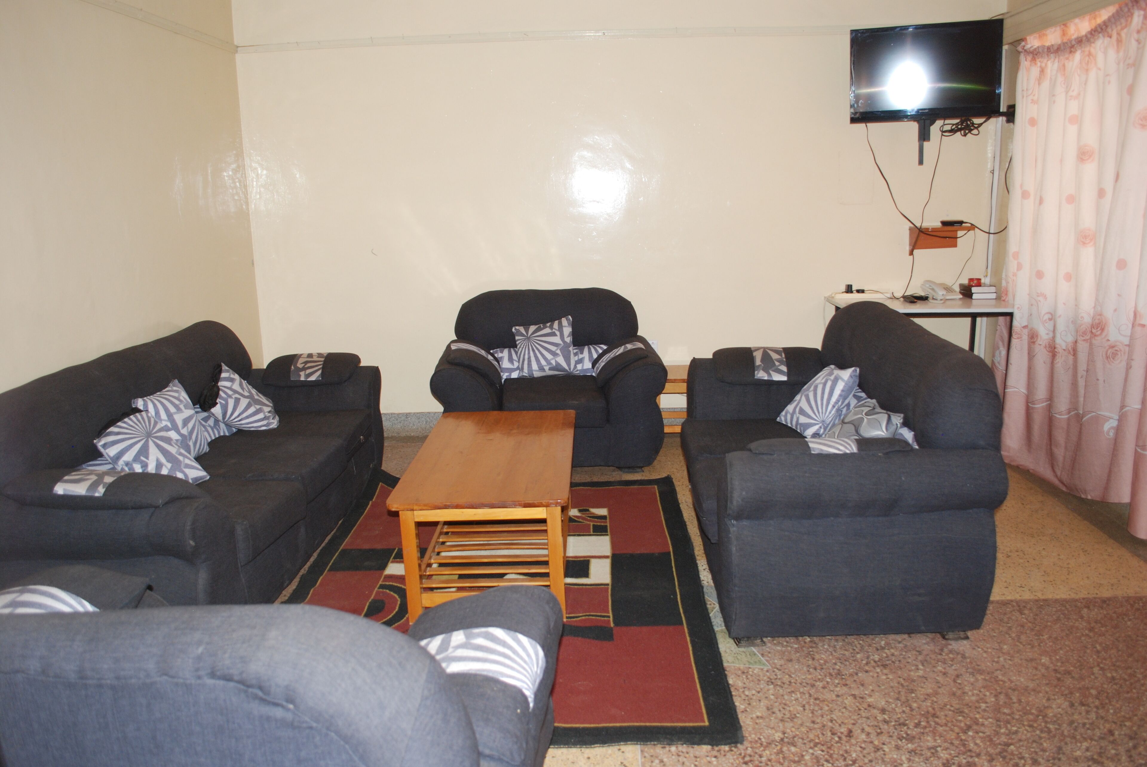 Comfort Apartment | Living area | 28-inch flat-screen TV with satellite channels, TV