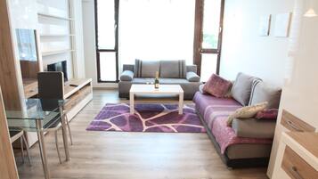 Suite estudio City | Zona de estar | Una televisión