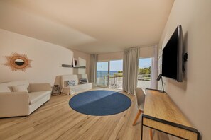 تلفزيون بشاشة مسطحة بحجم 49-بوصة يعرض قنوات فضائية، تلفزيون