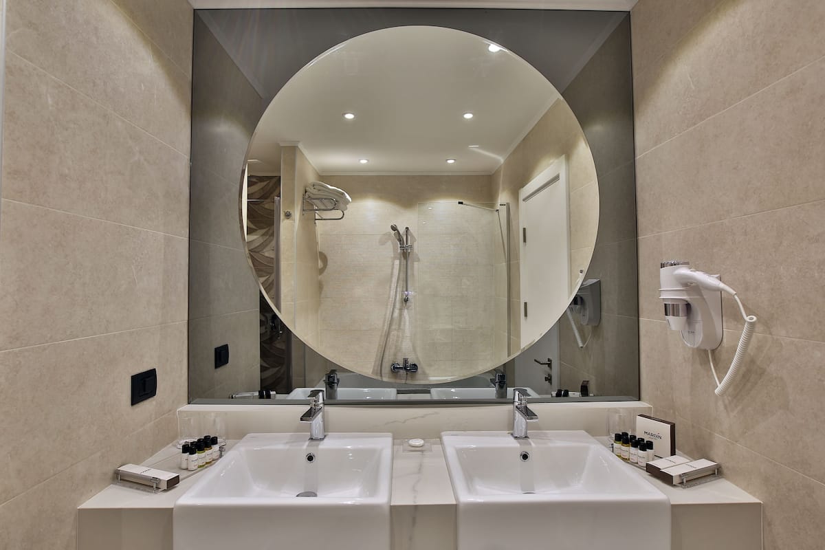 suite | bathroom | free toiletries, hair dryer, slippers, towels