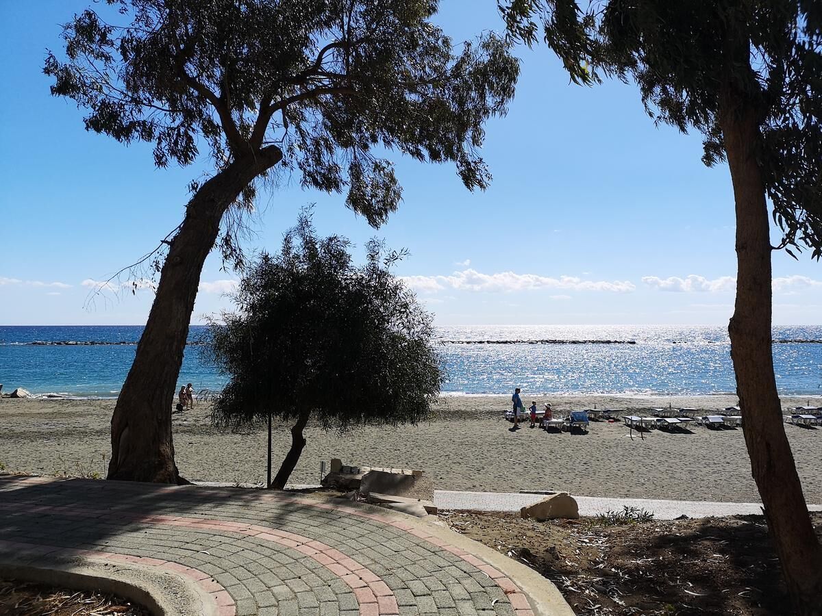 On the beach, sun loungers, beach towels