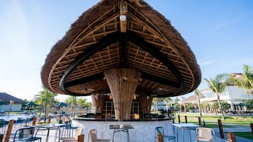 3 bars/lounges, poolside bar, beach bar