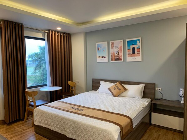 Premium bedding, down comforters, pillowtop beds, minibar