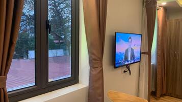 Premium bedding, down comforters, pillowtop beds, minibar