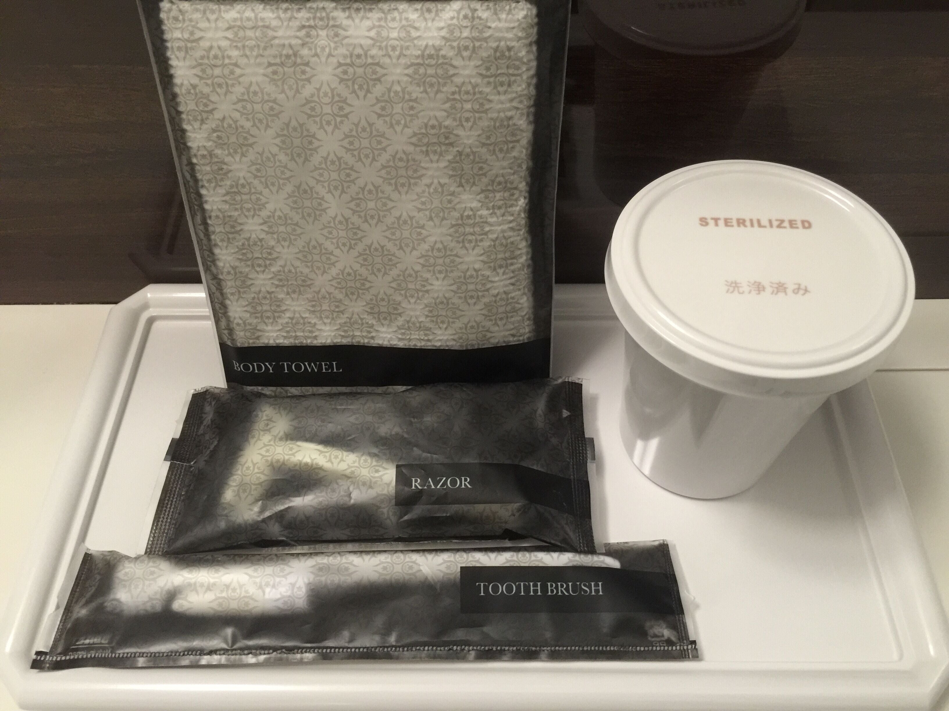 combined shower/bathtub, free toiletries, hair dryer, slippers