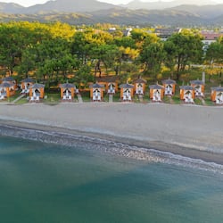 On the beach, sun-loungers, beach umbrellas, beach towels
