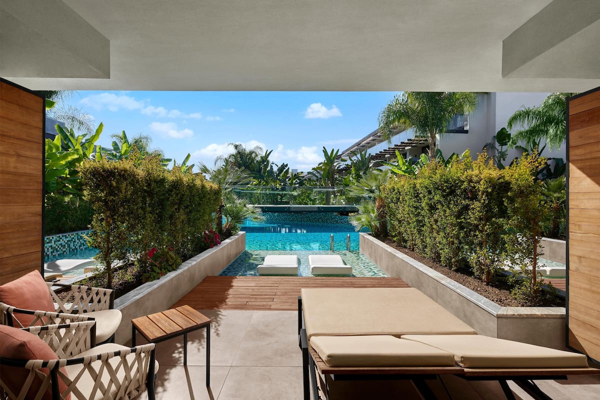 Superior Double Room, Pool Access | Free minibar, in-room safe, desk, laptop workspace