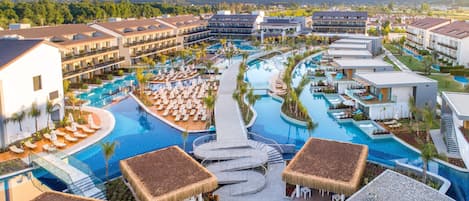 Indoor pool, seasonal outdoor pool, pool umbrellas, sun loungers