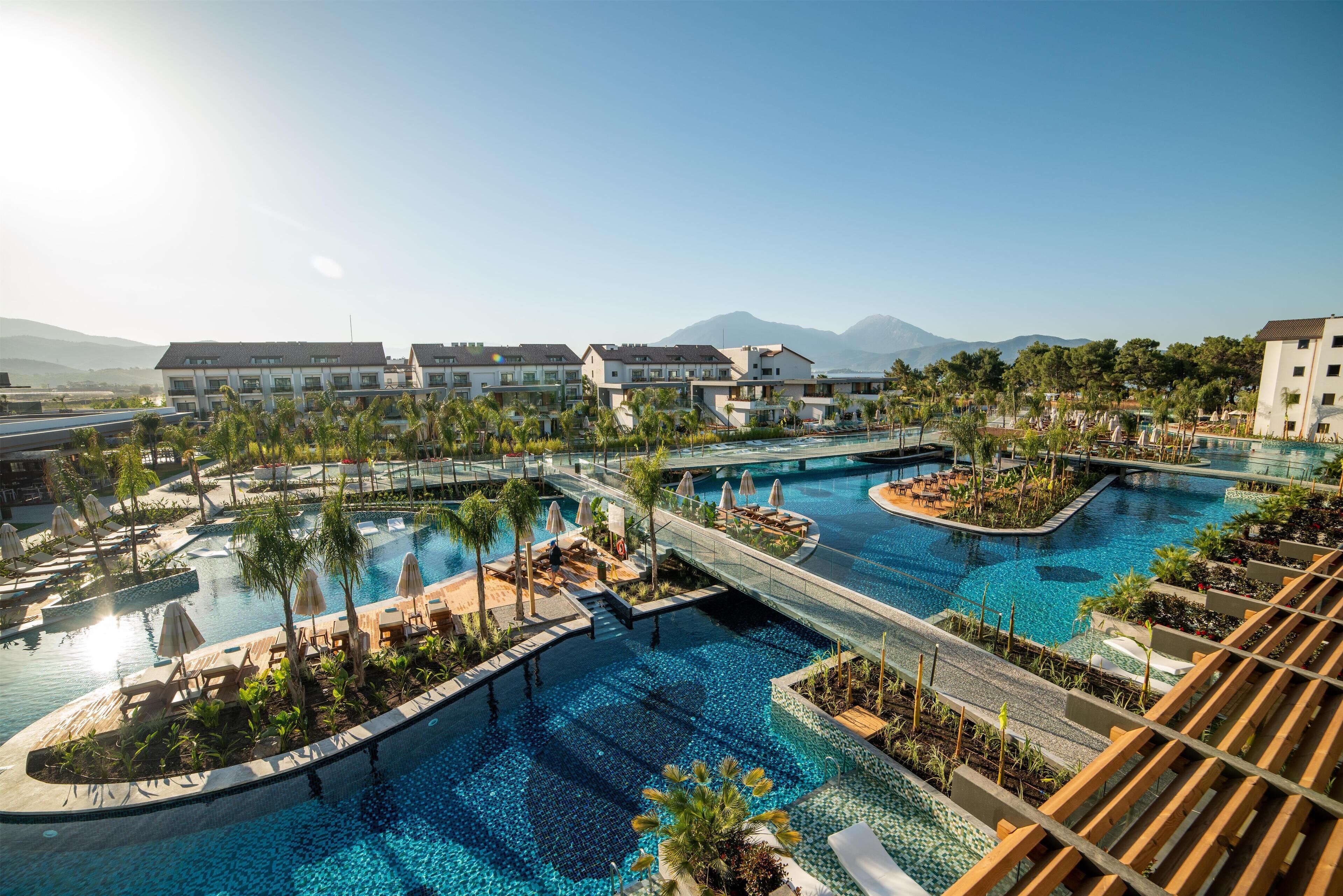 Indoor pool, seasonal outdoor pool, pool umbrellas, pool loungers