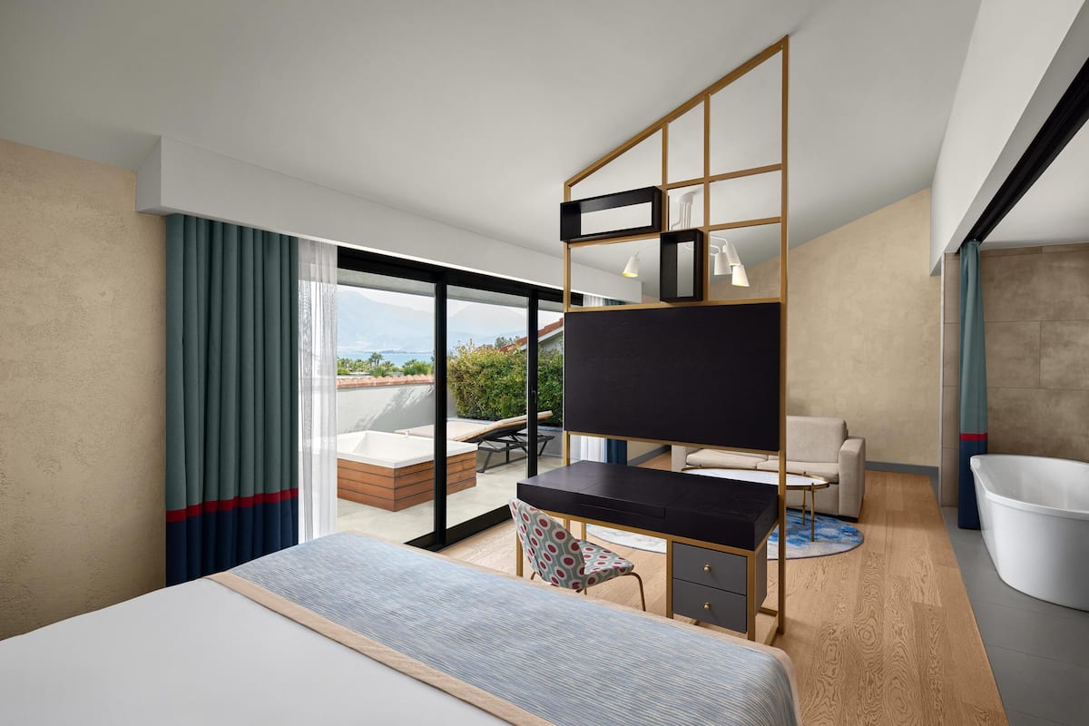 Penthouse, Jetted Tub | Free minibar, in-room safe, desk, laptop workspace