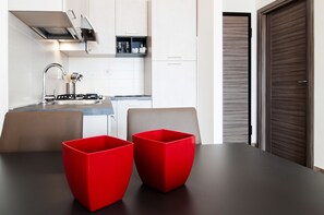 Apartment, 1 Bedroom (Blu) | Private kitchenette | Full-sized fridge, oven, stovetop, dishwasher - Fonte Laurentina Apartments (Rome)