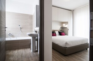 Apartment, 1 Bedroom (Rosso) | Bathroom | Hair dryer, bidet, towels - Fonte Laurentina Apartments (Rome)