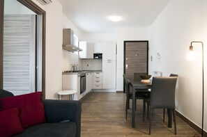 Apartment, 1 Bedroom (Grigio) | In-room dining - Fonte Laurentina Apartments (Rome)