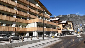 A multi-story hotel with balconies, a pharmacy, and a clinic. - EMERALD CENTRALE 022143-AT-615468 (Madonna di Campiglio)