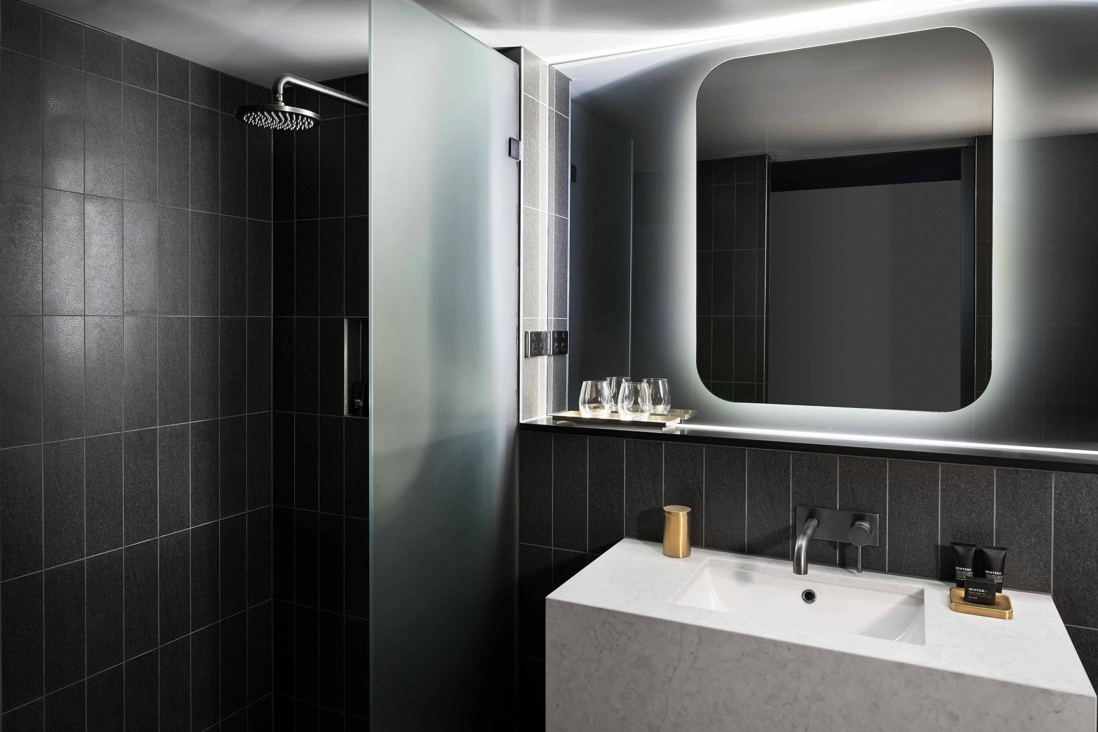 shower, rainfall showerhead, designer toiletries, hair dryer