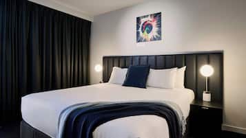 Premium bedding, pillow-top beds, free minibar, in-room safe