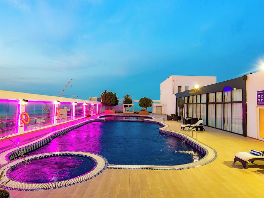 Outdoor pool, open 9:00 AM to 6:00 PM, pool loungers