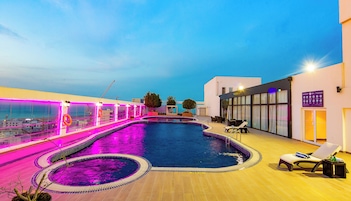 Outdoor pool, open 9:00 AM to 6:00 PM, sun loungers