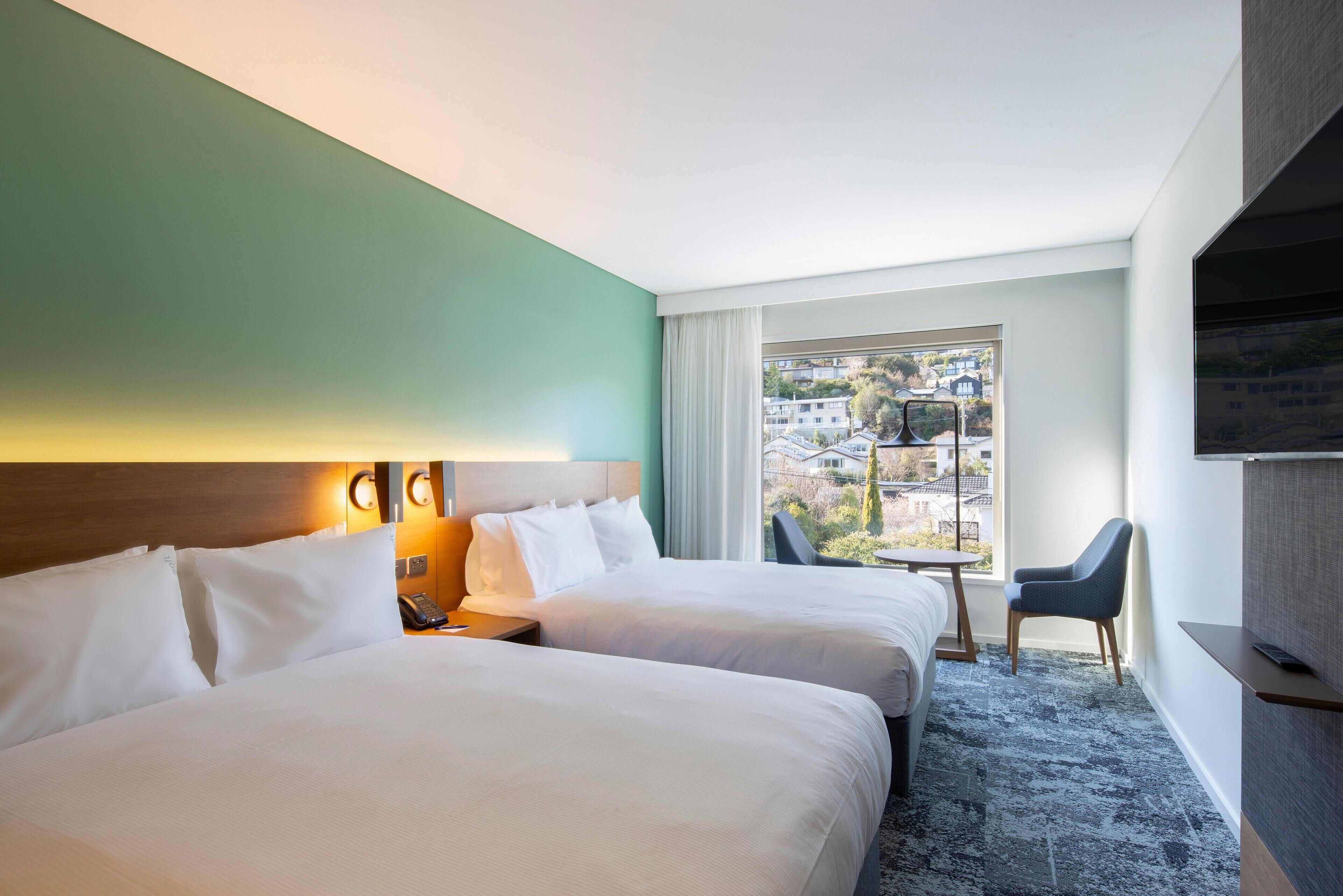 Premium bedding, in-room safe, blackout curtains, soundproofing