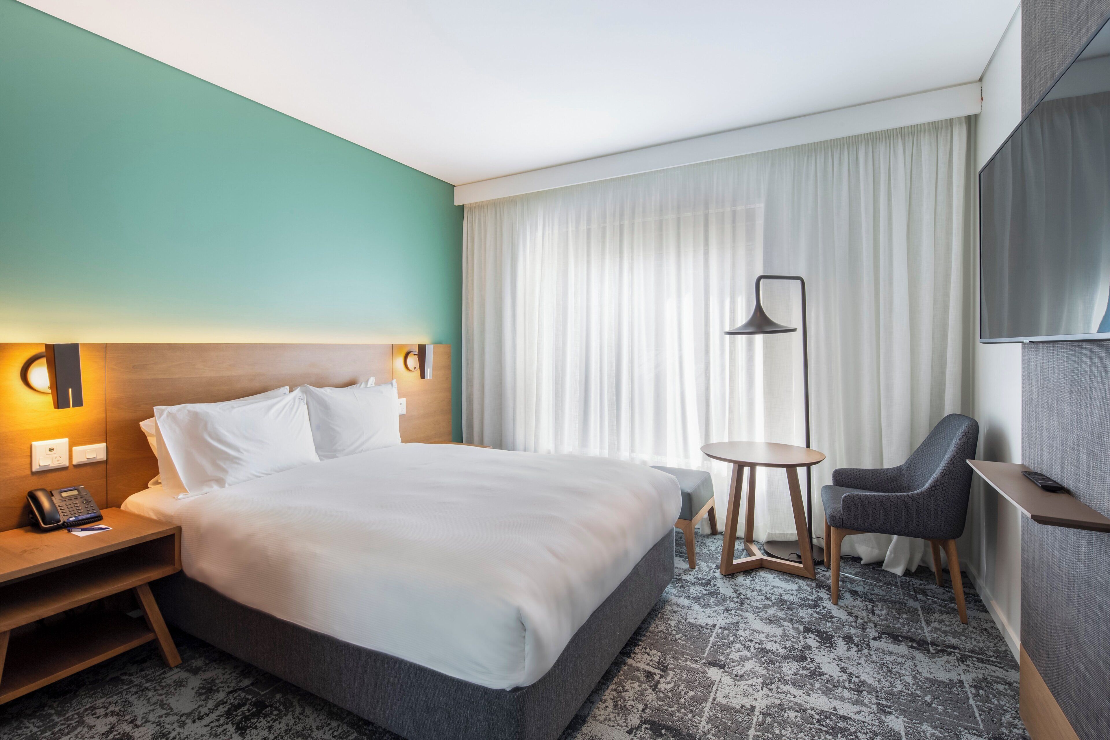 Premium bedding, in-room safe, blackout drapes, soundproofing