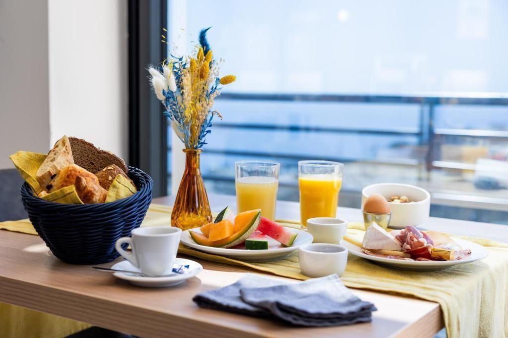 Daily buffet breakfast (EUR 14 per person)