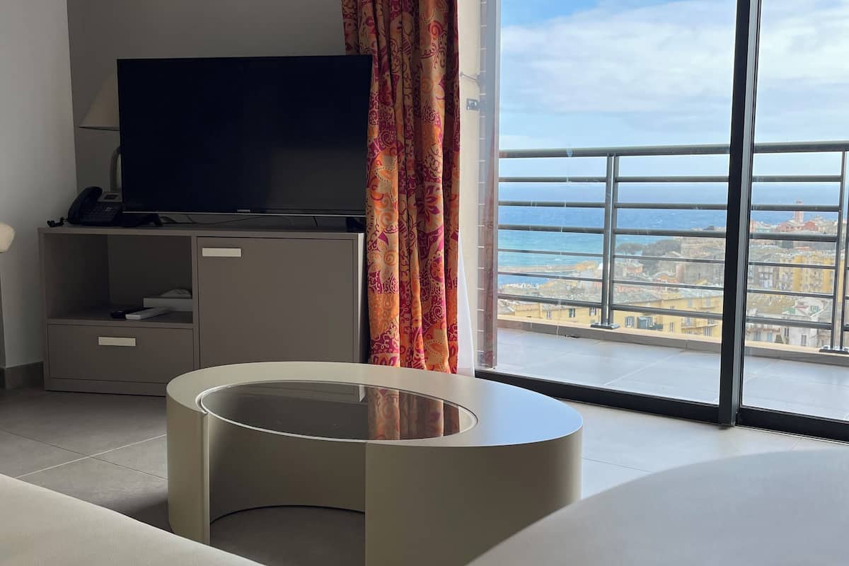 apartment, sea view | living area | flat-screen tv