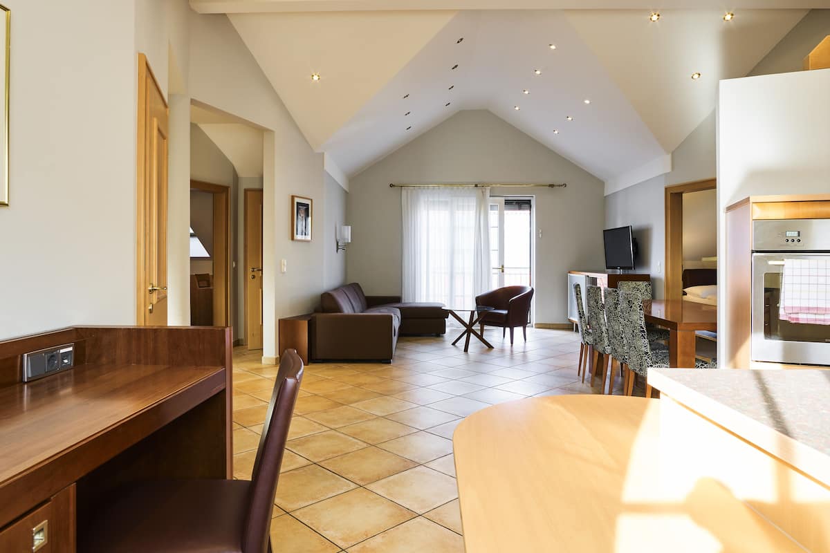 Holiday Apartment Penthouse mit Terrasse | Zona de estar | Una televisión de pantalla plana