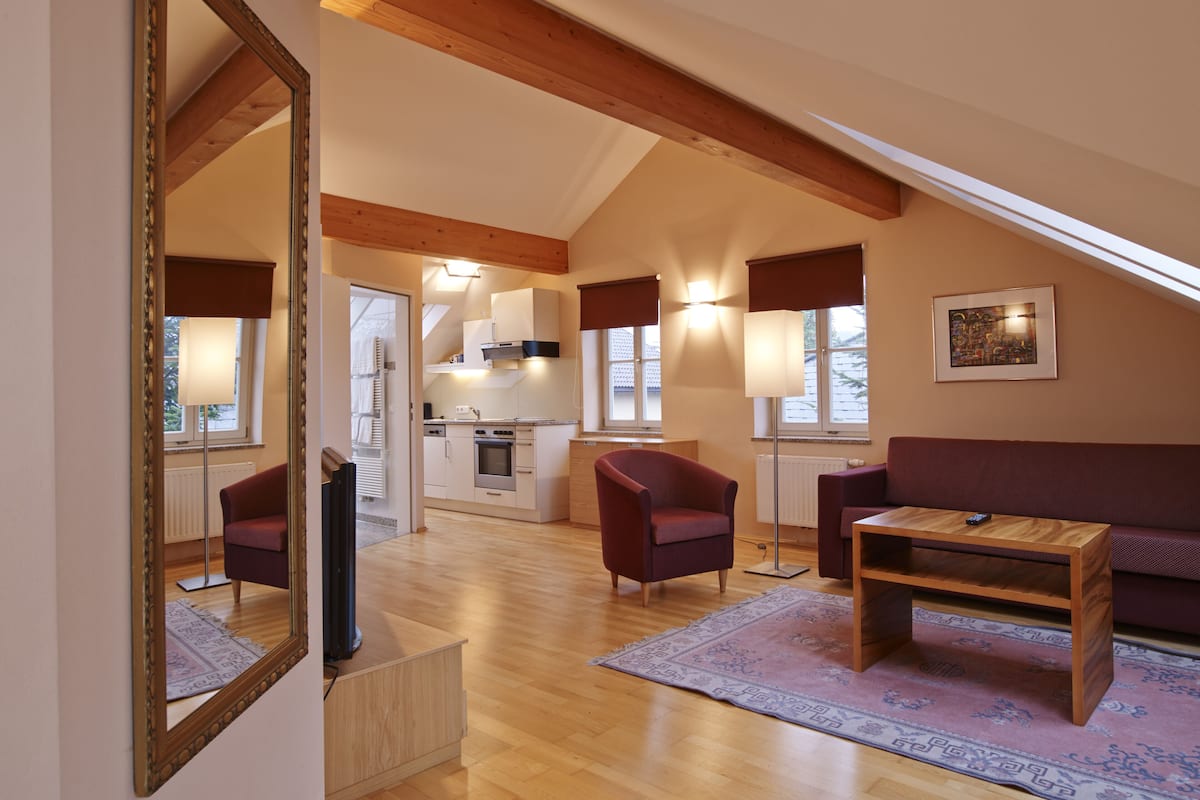 Holiday Apartement Villa Ceconi Penthouse | Living area | Flat-screen TV
