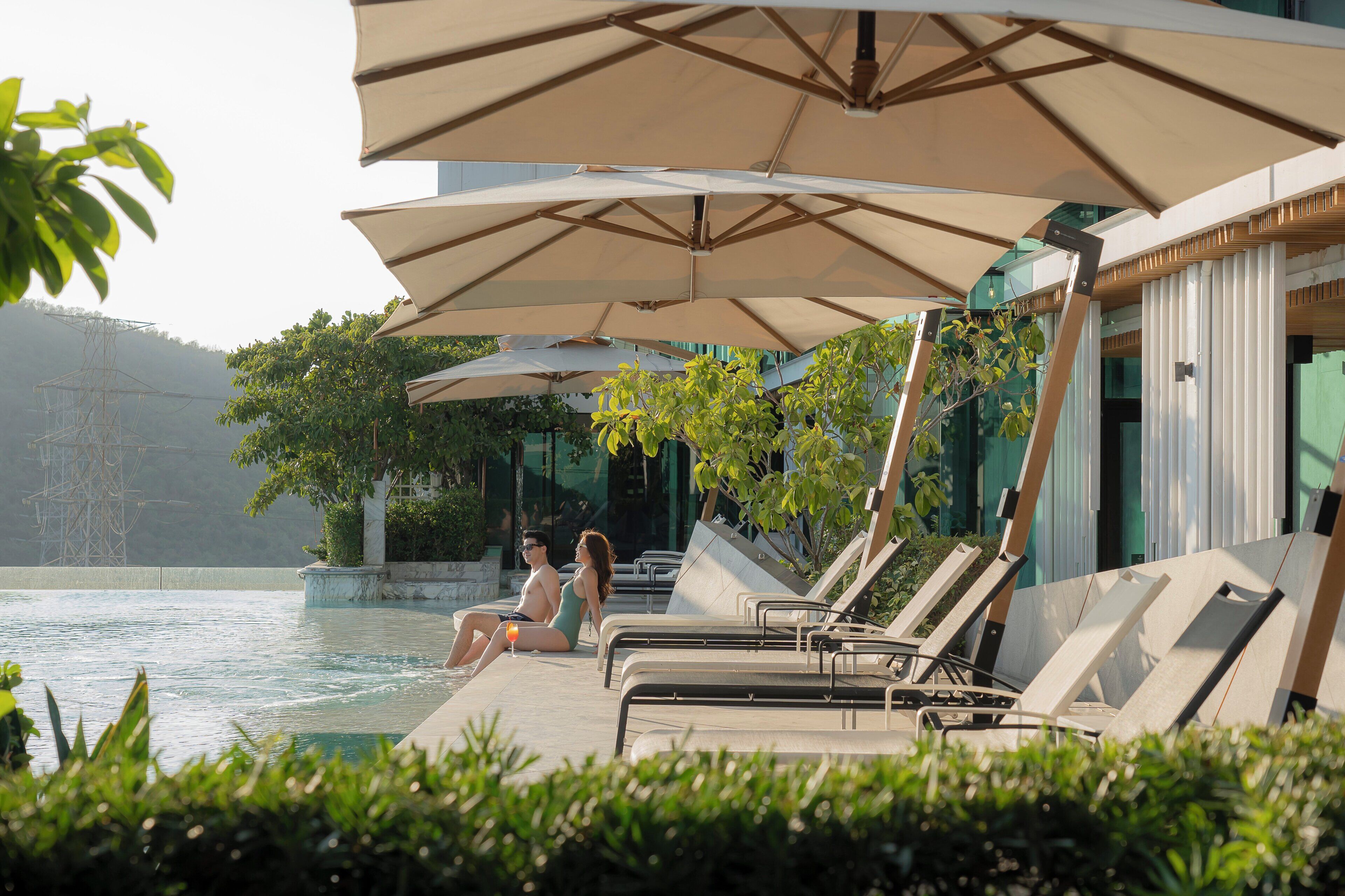 Outdoor pool, pool umbrellas, pool loungers
