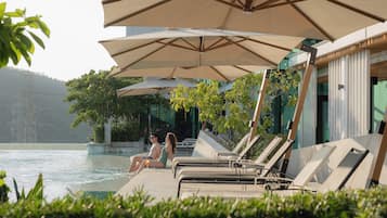 Outdoor pool, pool umbrellas, pool loungers