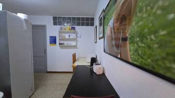Desk, blackout curtains, WiFi, bed sheets