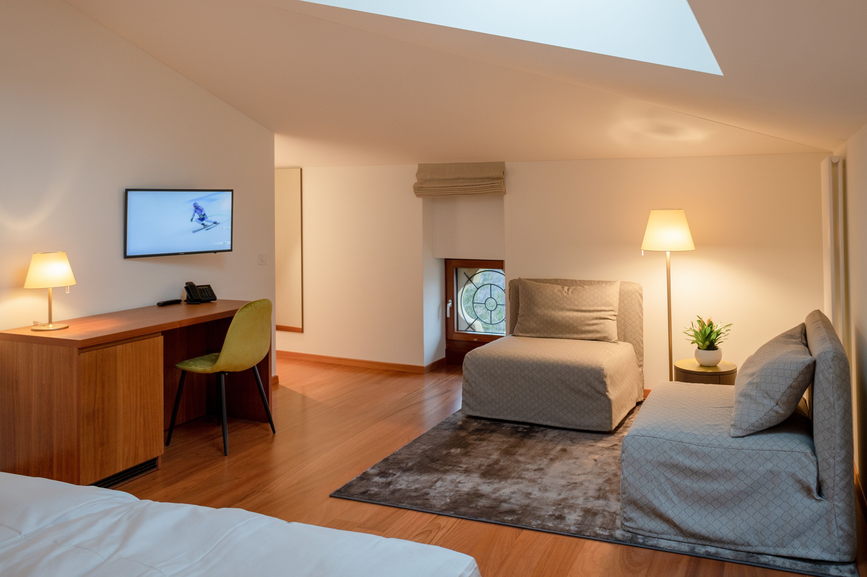 deluxe double room | minibar, in-room safe, desk, iron/ironing board