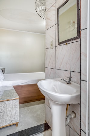 Double Room | Bathroom | Shower, hair dryer, towels, soap