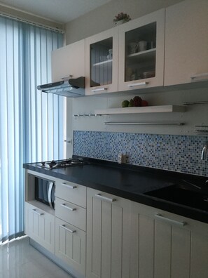 Fridge, microwave, stovetop, electric kettle