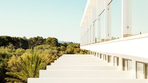 A modern building with a long, straight staircase leading up to a white facade with large windows. - Monsuau Cala D'Or Hotel - Adults Only (Felanitx)