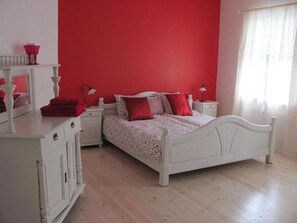 Pillow-top beds, desk, laptop workspace, blackout curtains