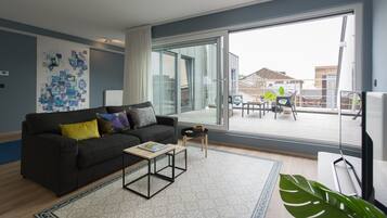 Appartement Luxe | Salle de séjour | Télévision à écran plat