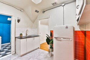 Estudi en suite superior | Cuina bàsica privada