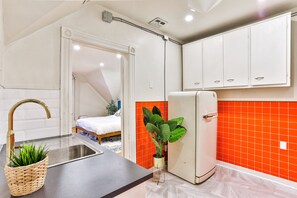 Estudi en suite superior | Cuina bàsica privada