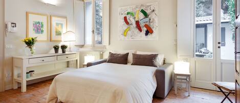 Apartment, 1 Bedroom | 1 bedroom, individually decorated, individually furnished, desk