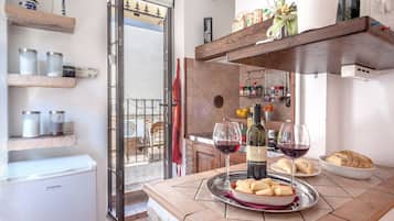 Apartment | Private kitchenette | Fridge, microwave, stovetop, coffee/tea maker