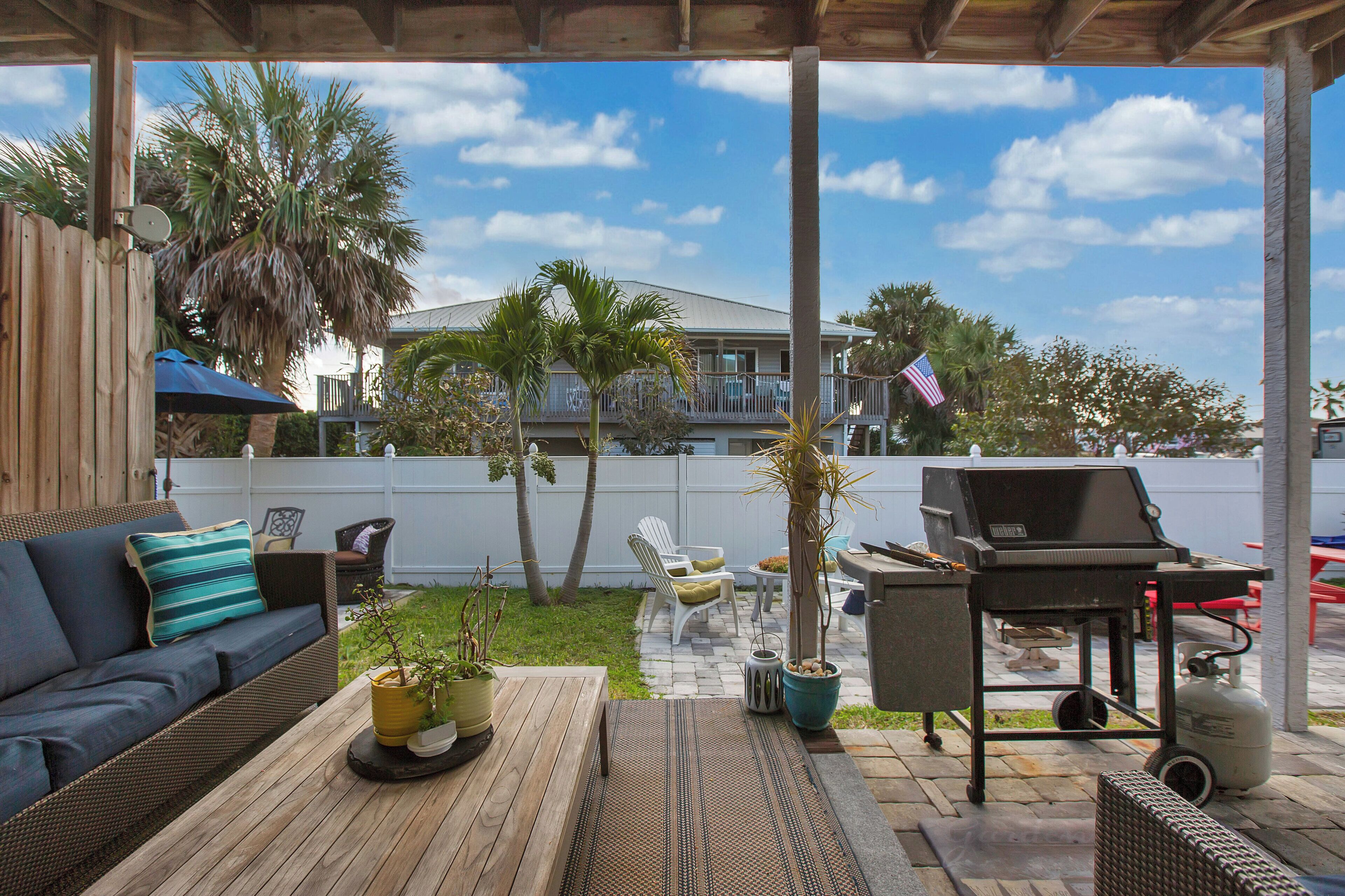 cozy area outside the kitchen barbecue picnic table Umbrella & outdoor shower